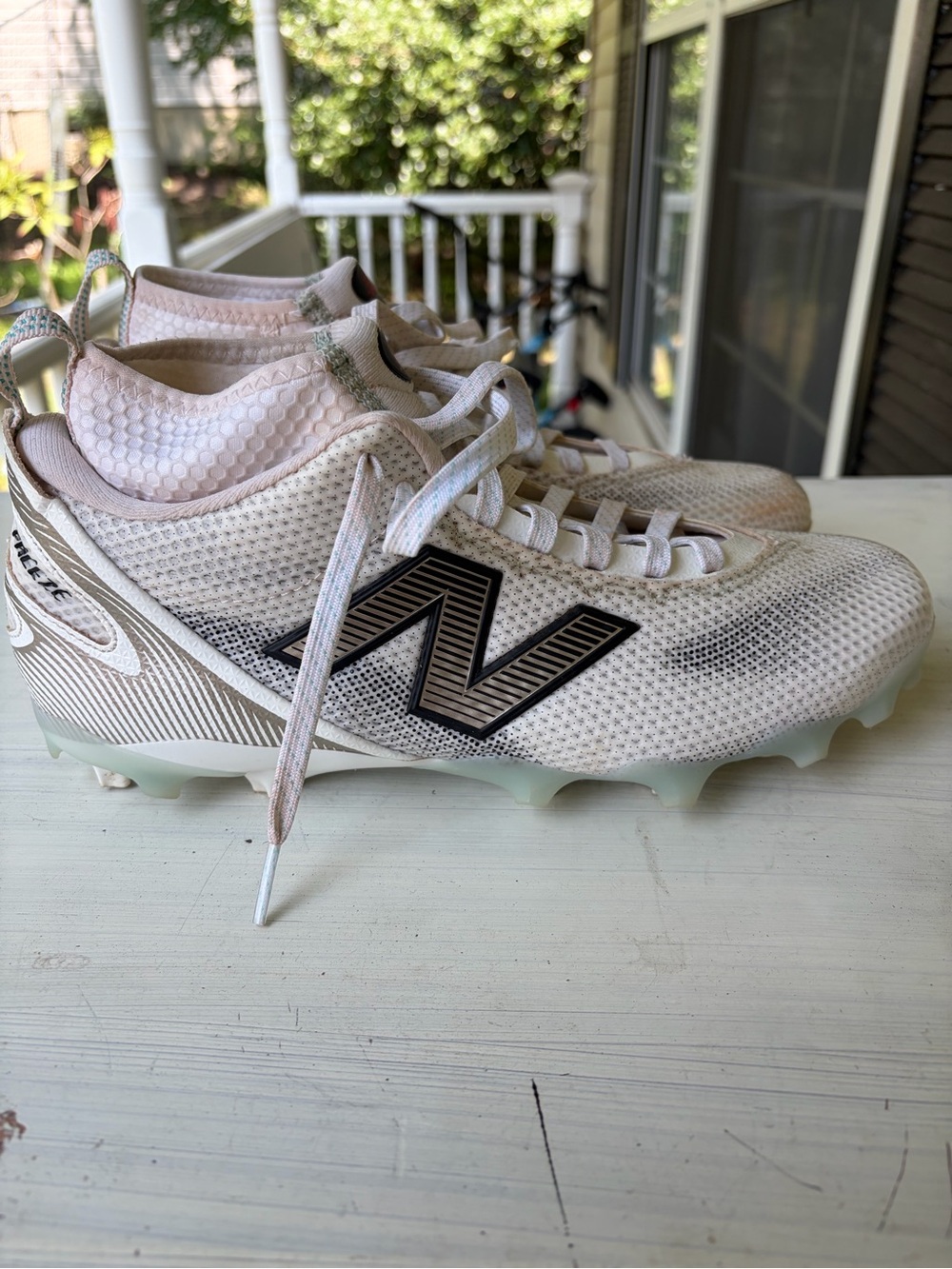New Balance White and Black Lacrosse Cleats